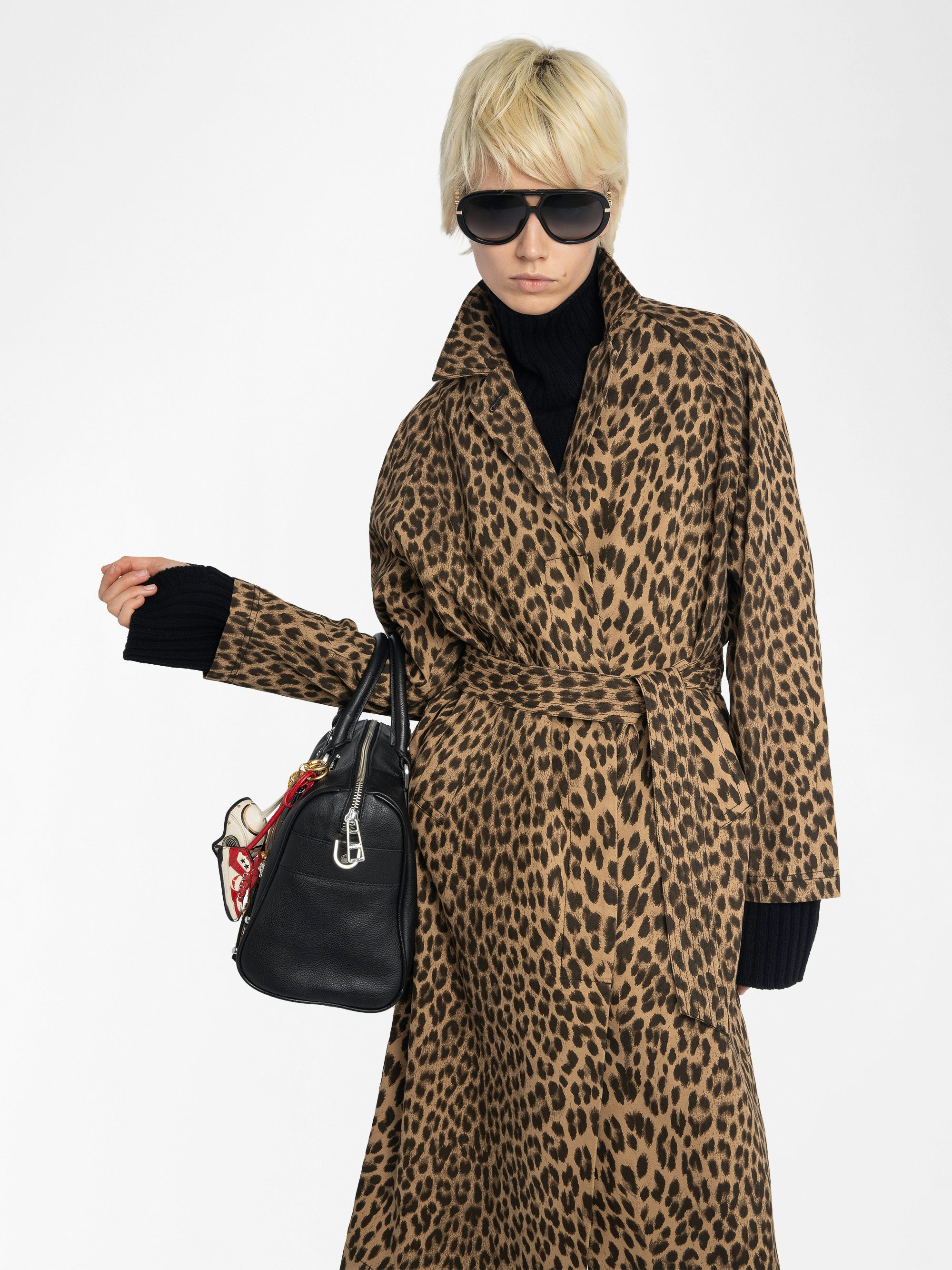 Mentle Coat - Cotton canvas coat with leopard print, long sleeves, button closure and front pockets.